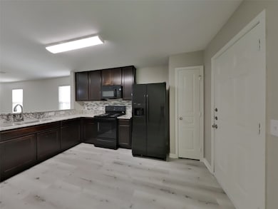 9922 Orchid Spring Ln, Houston, TX 77044 - photo 5