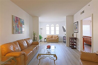 Living area featuring light wood-style flooring, p