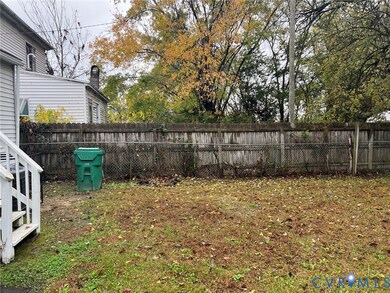 View of fenced backyard