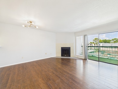 Living Room/Dining Room Combo with Wood Burning Fireplace