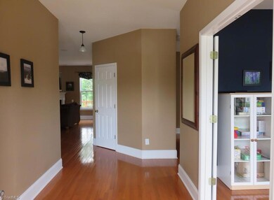 Wide halls and gleaming hardwood floors throughout the  main level greet you when entering with office to the right of the foyer.