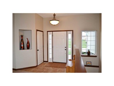 Other. Tiled foyer with built-ins