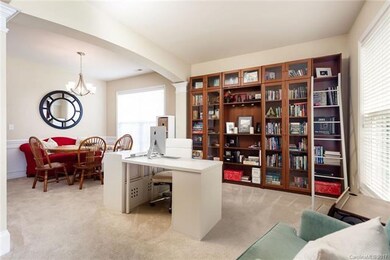 Formal Dining Room with chair railing, TONS of nat