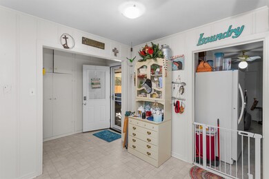 Spacious Laundry Room with Extra Freezer Space - off to the back door