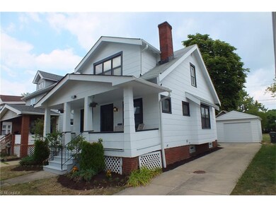 Side view of this lovely home showing concrete dri