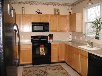 Kitchen. New solid surface counters and integrated sink!