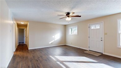 View of hallway and living room. New 2021 exterior