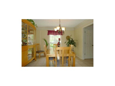 Formal dining room with deep crown molding accent