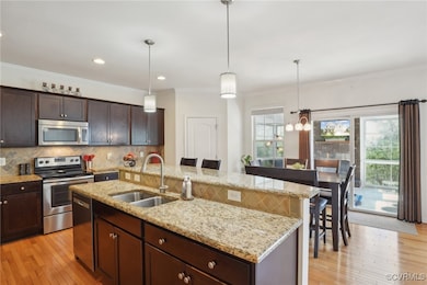 Kitchen leading into four season sun room with gas