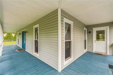 Covered Wrap Around Porch Laundry Room Entrance