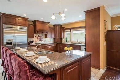 Gourmet kitchen island with sink and granite count