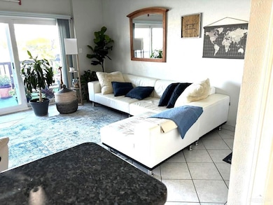 Living area with tile patterned floors