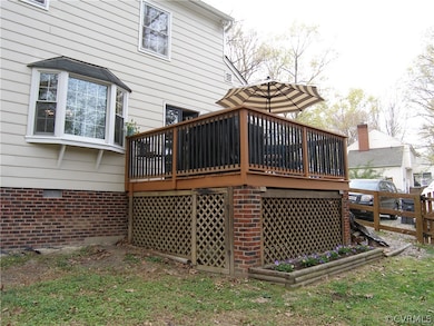 Rear Deck with Lattice Underneath for Storage, Planting Bed with Pansies