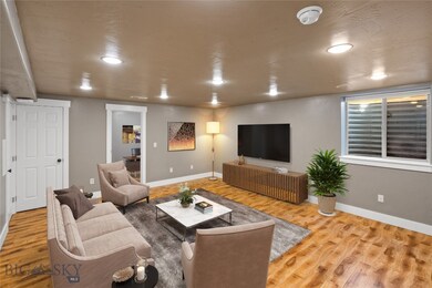 Downstairs family room/virtually stage