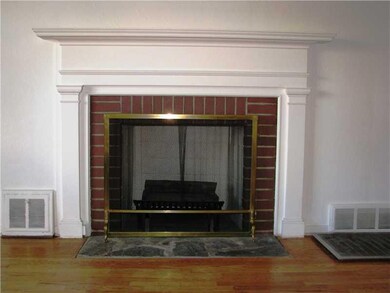 Living Room. Beautiful log burning fireplace
