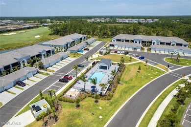 Birds eye view of property with a residential view