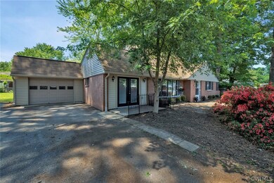 Garage, driveway and additional entranceway!
