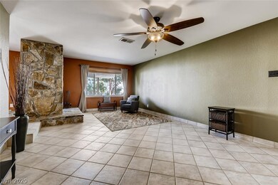 Spacious living room with woodburning fireplace