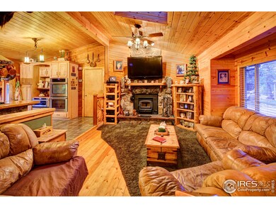 Living Room with Moss Rock Fireplace