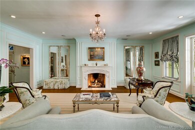 The grand formal living room evokes elegance and s