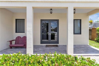 Porch, main entrance. Impact door.