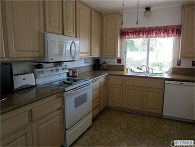 Open kitchen, granite counter tops, newer cabinets