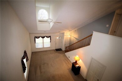 View from loft of living and dining areas.
