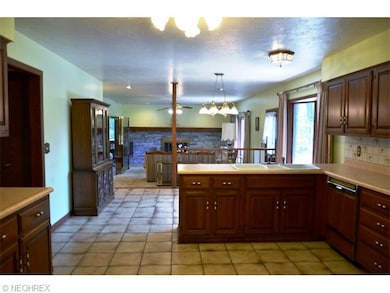 KITCHEN OVERLOOKS FAMILY ROOM-OPEN AND SPACIOUS