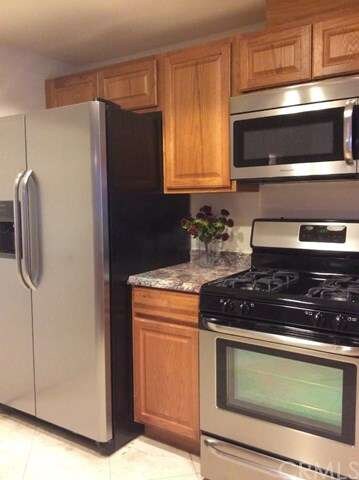 Kitchen has Brand new cabinets and appliances (wit