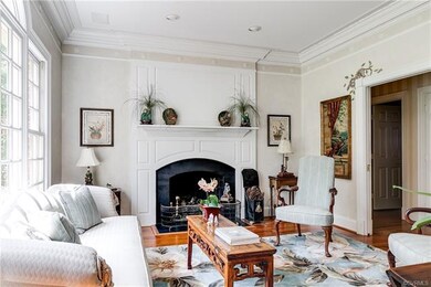Parlor with fireplace and extraordinary millwork