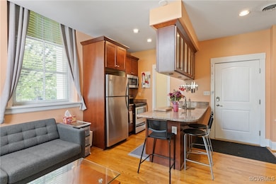 Kitchen with appliances with stainless steel finis