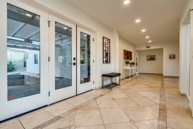 Foyer -Doors Leading to Back Courtyard