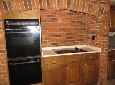The Smooth Surface Cooktop and Double Ovens in a B