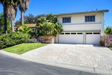3 Car Garage includes Built in Storage & Work Area