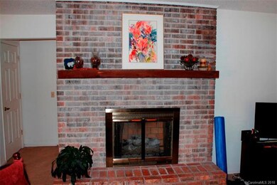 Brick fireplace with gas logs