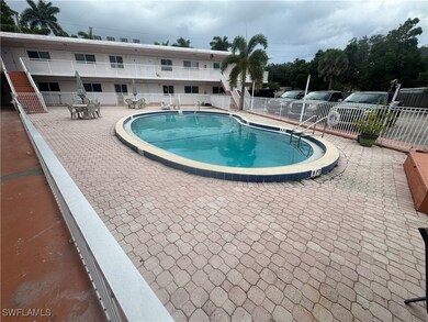 Community pool featuring a patio area