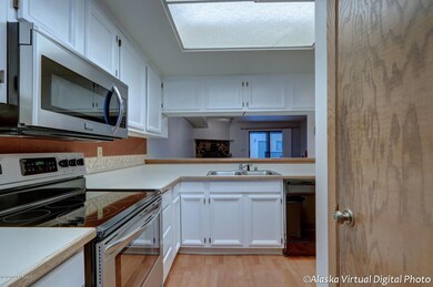 Kitchen open to dining/living room