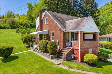 Beautiful corner lot! Large covered front porch,