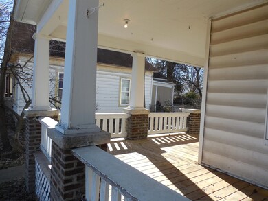 Covered Wrap-Around Front Porch