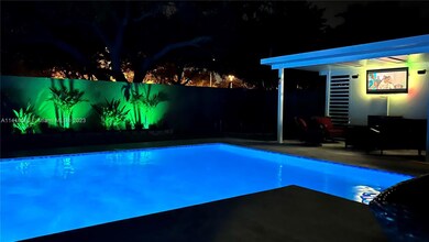Night view of pool & patio