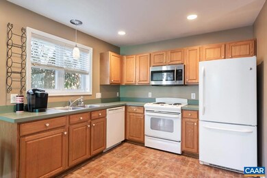 Clean, crisp, tile floored kitchen