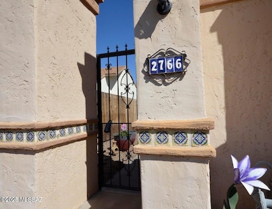 Gate from street to outside of house