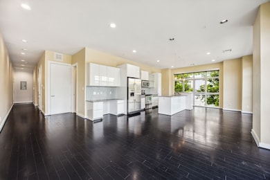 Open concept room with recessed lighting and dark