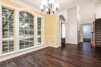 Another view of the dining room with the large win