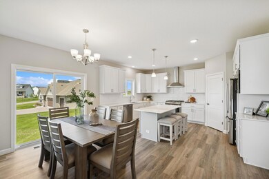Dining Area - photo is of a previous inventory home. Inquire for more details and options.