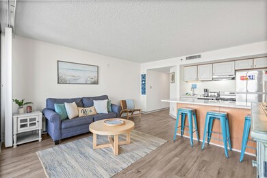 Living room featuring light hardwood / wood-style 