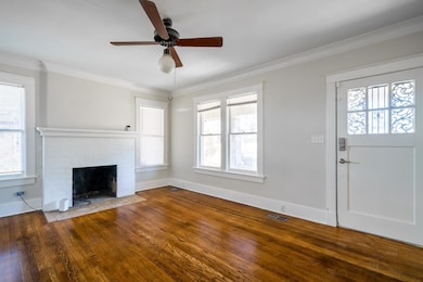 Notice the refinished hardwoods and fresh paint.
