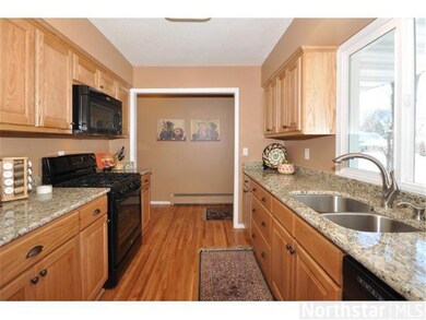 Recently completed kitchen with new cabinets, gran