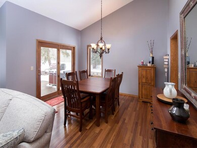 Dining room flows from the kitchen and into the family room