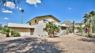 Front view of home with Piestewa Peak